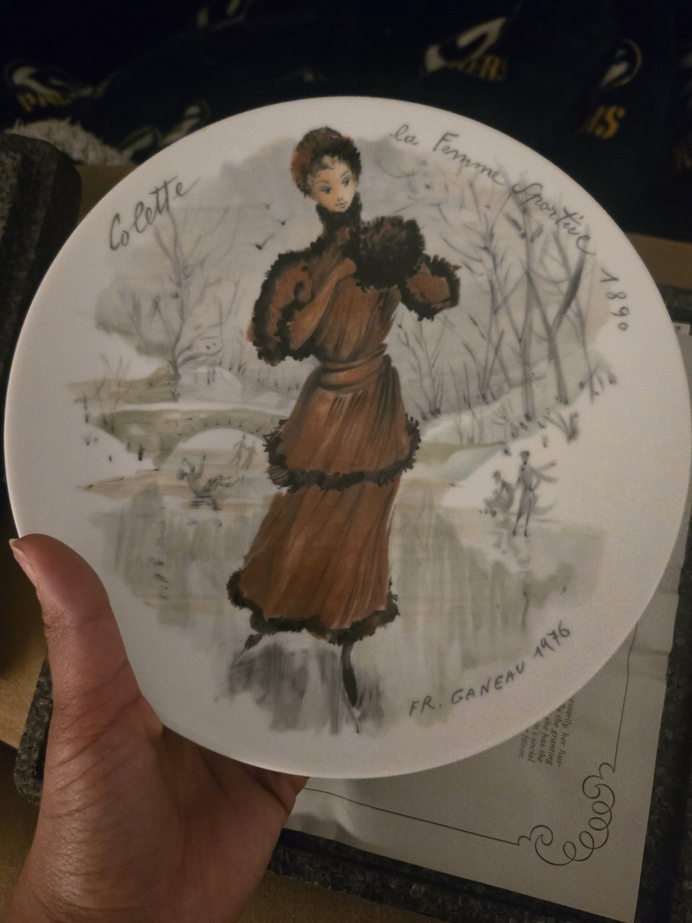 Vintage-style Decorative Plate with Winter Lady Illustration